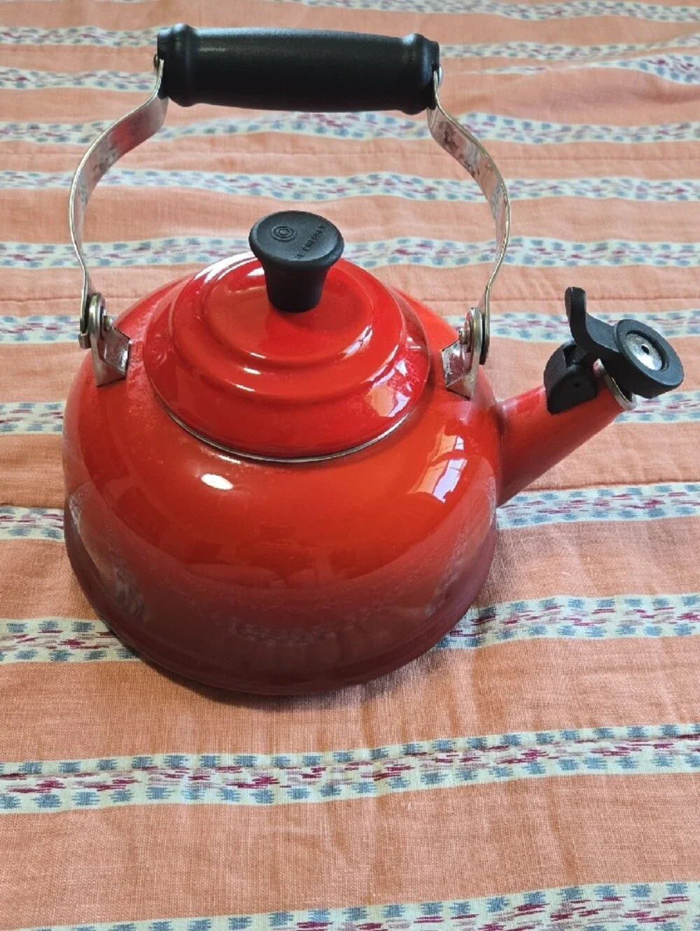 Le Creuset Red Enamel Classic Whistling Tea Kettle with Black Handle